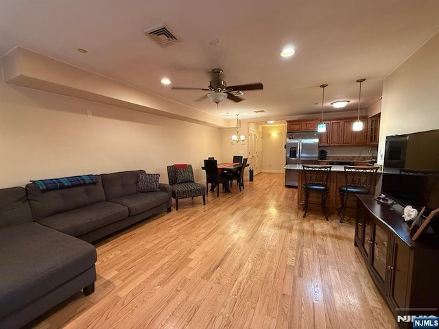 124 68th St Unit 204, Guttenberg, NJ 07093 - living room with light wood-style floors, a ceiling fan, and recessed lighting