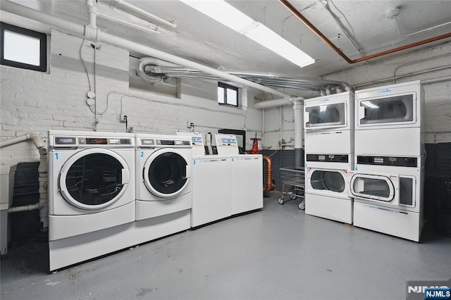 50 Reservoir Ave Unit 201, Jersey City, NJ 07307 - community laundry room with estacked washer and dryer and separate washer and dryer
