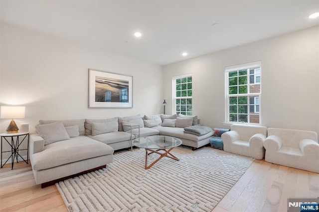 83 Landmark Ln, Fair Lawn, NJ 07410 - living room featuring light wood-style floors and recessed lighting