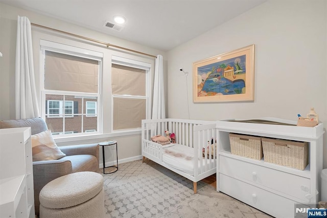 83 Landmark Ln, Fair Lawn, NJ 07410 - bedroom featuring a crib