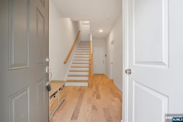 83 Landmark Ln, Fair Lawn, NJ 07410 - foyer featuring light wood-style floors, stairs, recessed lighting, and baseboards