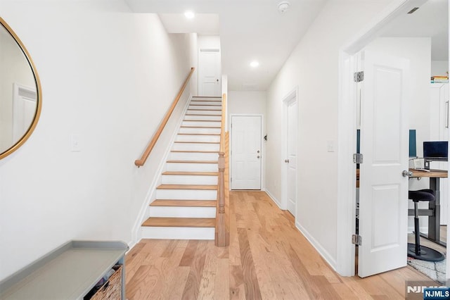83 Landmark Ln, Fair Lawn, NJ 07410 - stairway with wood finished floors, recessed lighting, and baseboards