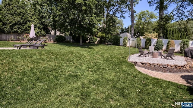 27 Bristol Pl, Wayne, NJ 07470 - view of yard with a fire pit and a patio