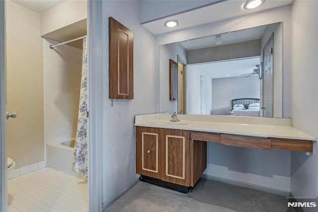 53 Princeton Pl, Wayne, NJ 07470 - full bathroom with toilet, vanity, baseboards, shower / bath combo with shower curtain, and ensuite bathroom