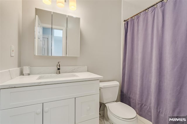 53 Princeton Pl, Wayne, NJ 07470 - bathroom with toilet, vanity, and curtained shower
