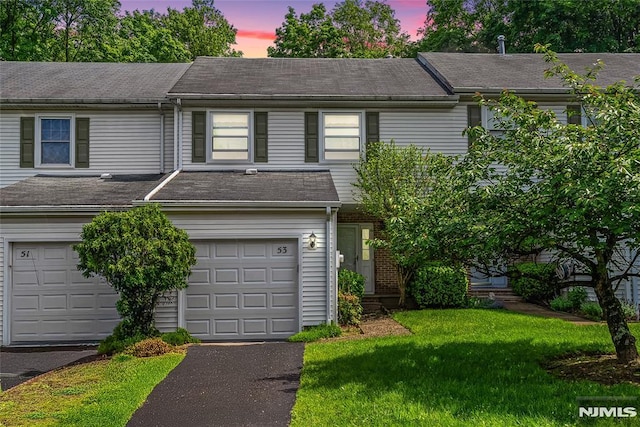 53 Princeton Pl, Wayne, NJ 07470 - view of property featuring a lawn and asphalt driveway