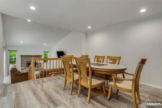 53 Princeton Pl, Wayne, NJ 07470 - dining area with wood finished floors, recessed lighting, a fireplace, lofted ceiling, and baseboards