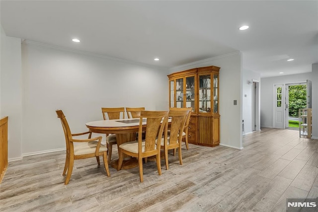 53 Princeton Pl, Wayne, NJ 07470 - dining area featuring light wood finished floors, recessed lighting, ornamental molding, and baseboards