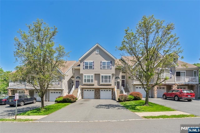 708 Wendover Ct, Randolph Township, NJ 07869 - view of front of property featuring an attached garage, stairs, and driveway