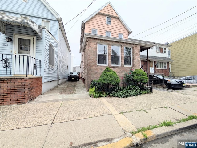 717 Warren St, Harrison, NJ 07029 - view of front facade featuring brick siding