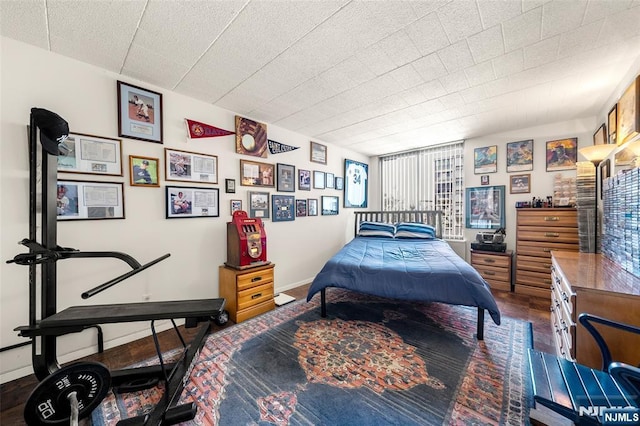 9060 Palisade Unit 612, North Bergen, NJ 07047 - bedroom featuring baseboards and wood finished floors