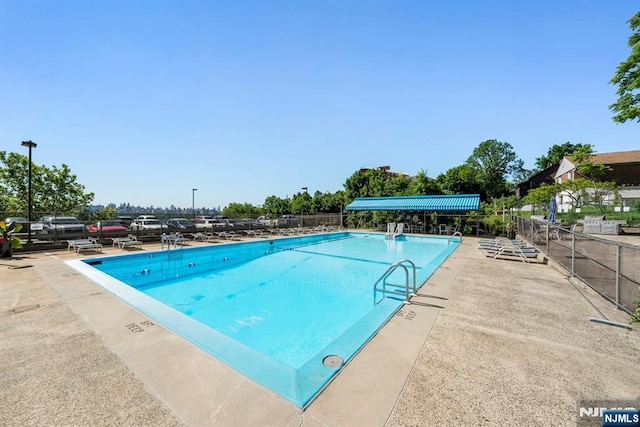 9060 Palisade Unit 612, North Bergen, NJ 07047 - community pool featuring a patio