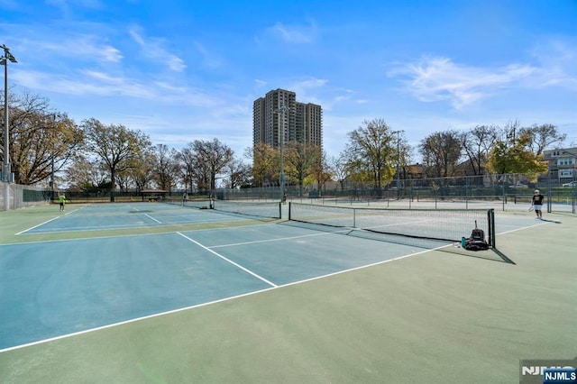 9060 Palisade Unit 612, North Bergen, NJ 07047 - view of tennis court featuring community basketball court