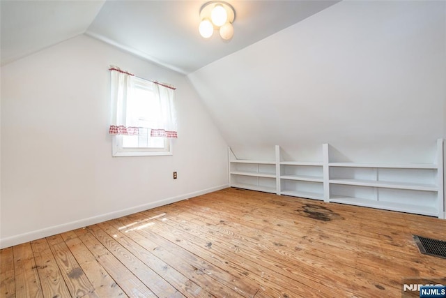 57 Burnside, Wanaque, NJ 07420 - bonus room featuring lofted ceiling, hardwood / wood-style flooring, and baseboards