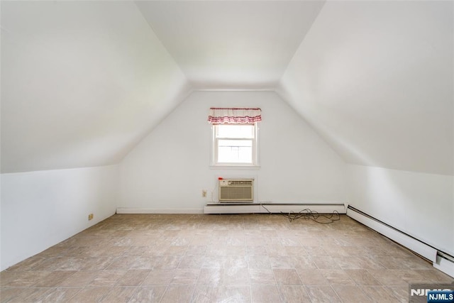 57 Burnside, Wanaque, NJ 07420 - additional living space with a baseboard heating unit, vaulted ceiling, and a wall mounted AC