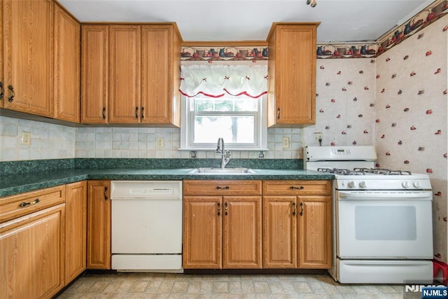 57 Burnside, Wanaque, NJ 07420 - kitchen with white appliances, a sink, dark countertops, backsplash, and brown cabinets