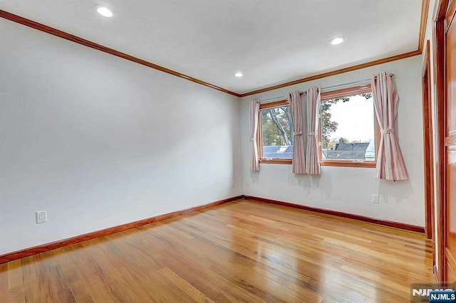 238 E Johnson Ave, Bergenfield, NJ 07621 - unfurnished room featuring crown molding, baseboards, light wood-type flooring, and recessed lighting