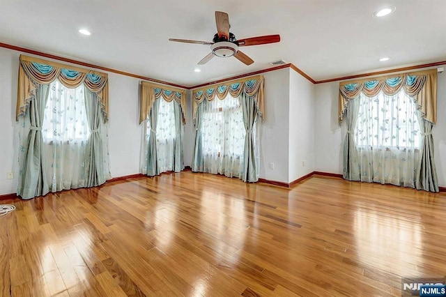 238 E Johnson Ave, Bergenfield, NJ 07621 - unfurnished room with crown molding, a ceiling fan, healthy amount of natural light, wood finished floors, and recessed lighting
