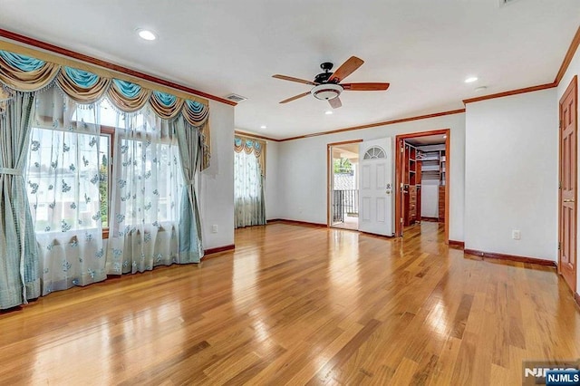 238 E Johnson Ave, Bergenfield, NJ 07621 - empty room with crown molding, a ceiling fan, light wood finished floors, baseboards, and recessed lighting