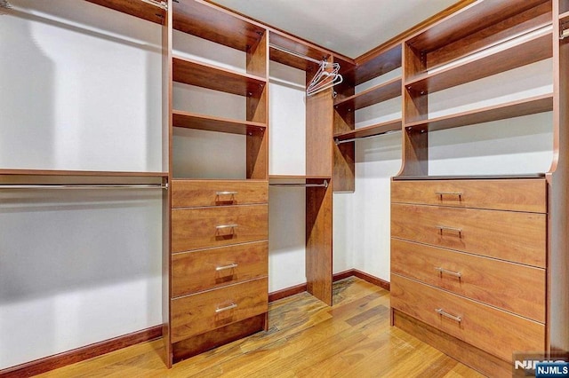 238 E Johnson Ave, Bergenfield, NJ 07621 - walk in closet with light wood-style flooring