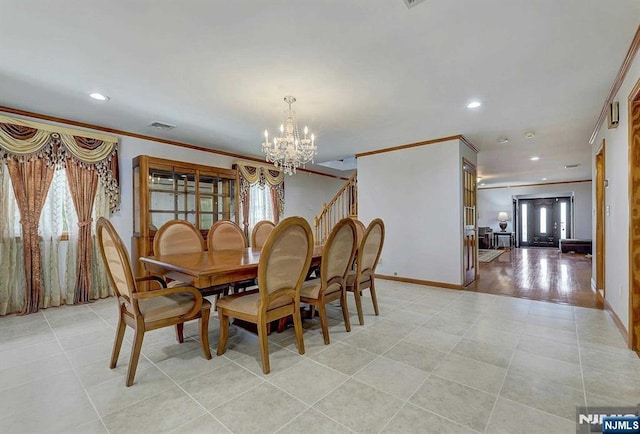 238 E Johnson Ave, Bergenfield, NJ 07621 - dining area with a chandelier, recessed lighting, plenty of natural light, crown molding, and baseboards