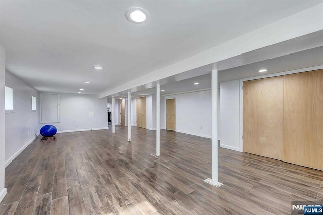 238 E Johnson Ave, Bergenfield, NJ 07621 - basement with wood finished floors, baseboards, and recessed lighting