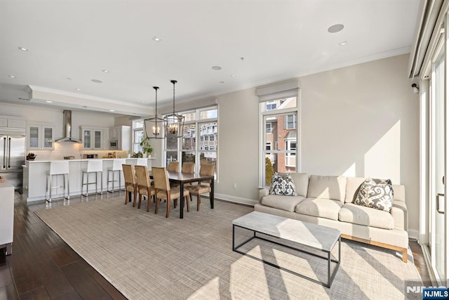 443 Albany Ct Unit 443, West New York, NJ 07093 - living area with dark wood-style floors, ornamental molding, baseboards, recessed lighting, and a chandelier