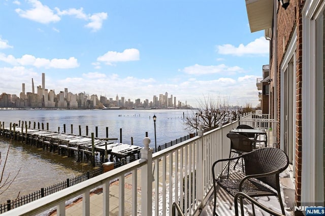 443 Albany Ct Unit 443, West New York, NJ 07093 - balcony with a water view, a dock, and a view of skyline