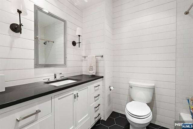 443 Albany Ct Unit 443, West New York, NJ 07093 - full bathroom with vanity, toilet, tile patterned floors, and a shower