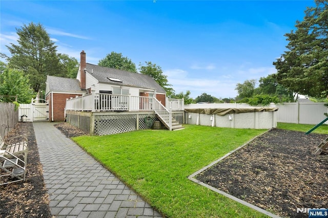 33 Irwin Pl, Bloomfield, NJ 07003 - rear view of property featuring a gate and a wooden deck