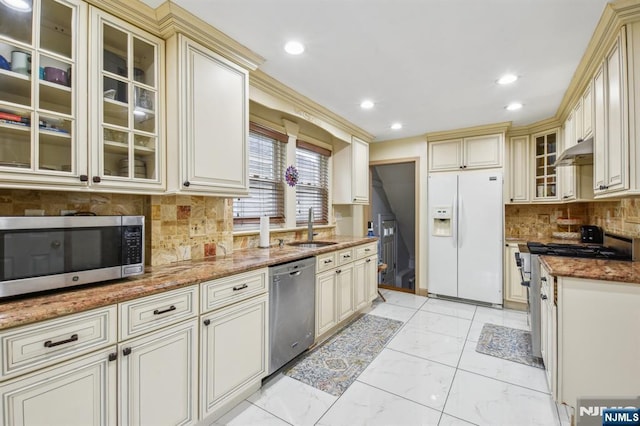 24 Willet, Bloomfield, NJ 07003 - kitchen featuring stainless steel appliances, cream cabinets, a sink, under cabinet range hood, and recessed lighting