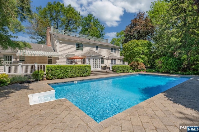 2 Olde Lantern Ct, Montvale, NJ 07645 - swimming pool featuring a patio area, french doors, and a wooden deck