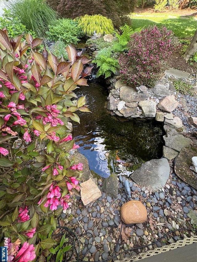 2 Olde Lantern Ct, Montvale, NJ 07645 - exterior view of a garden pond
