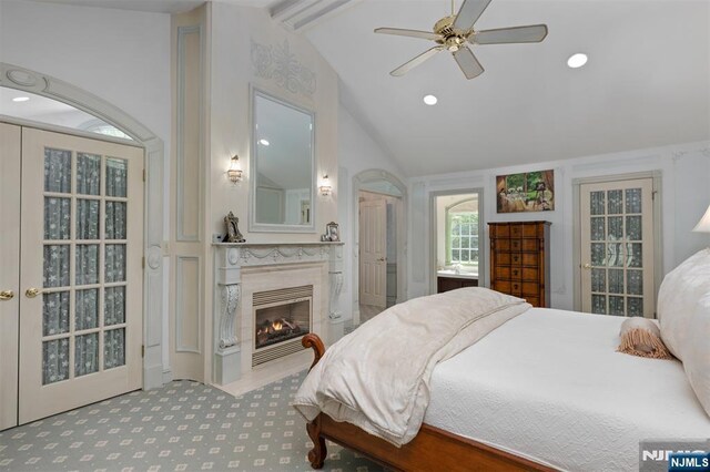 2 Olde Lantern Ct, Montvale, NJ 07645 - bedroom with carpet flooring, vaulted ceiling, a premium fireplace, and recessed lighting