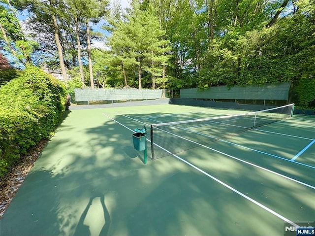 2 Olde Lantern Ct, Montvale, NJ 07645 - view of tennis court featuring view of scattered trees