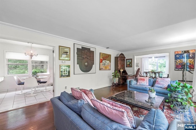 430 Jones Rd, Englewood, NJ 07631 - living area with a chandelier, ornamental molding, and wood finished floors