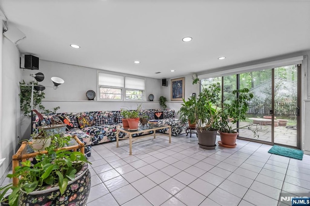 430 Jones Rd, Englewood, NJ 07631 - living room with light tile patterned floors and recessed lighting