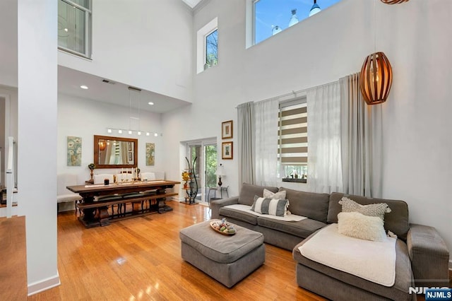 21 Sheridan Ave, West Orange, NJ 07052 - living area with wood finished floors and a high ceiling