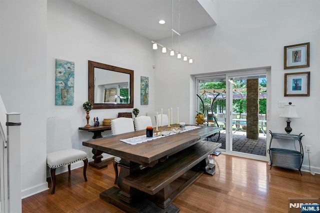 21 Sheridan Ave, West Orange, NJ 07052 - dining space with wood finished floors, baseboards, and a high ceiling