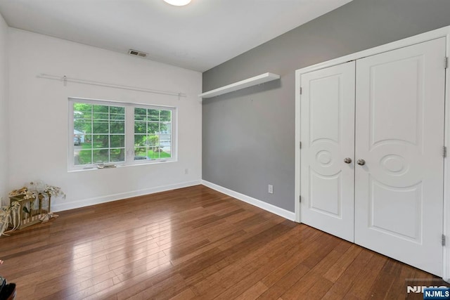 21 Sheridan Ave, West Orange, NJ 07052 - unfurnished bedroom with wood-type flooring and baseboards