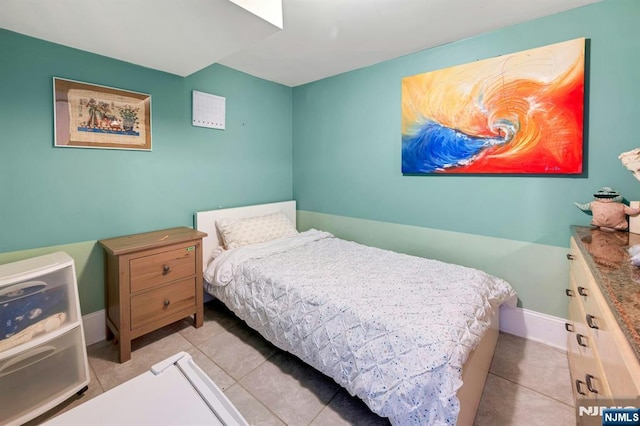 21 Sheridan Ave, West Orange, NJ 07052 - bedroom featuring light tile patterned floors and baseboards
