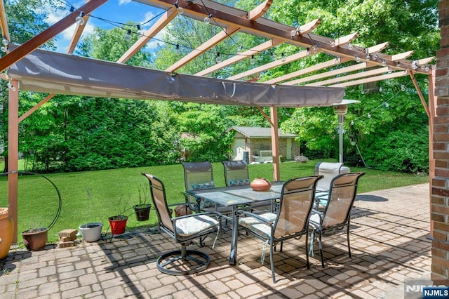 21 Sheridan Ave, West Orange, NJ 07052 - view of patio / terrace featuring outdoor dining space, an outbuilding, and a pergola