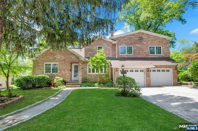 21 Sheridan Ave, West Orange, NJ 07052 - traditional-style home with a garage, decorative driveway, a front lawn, and brick siding
