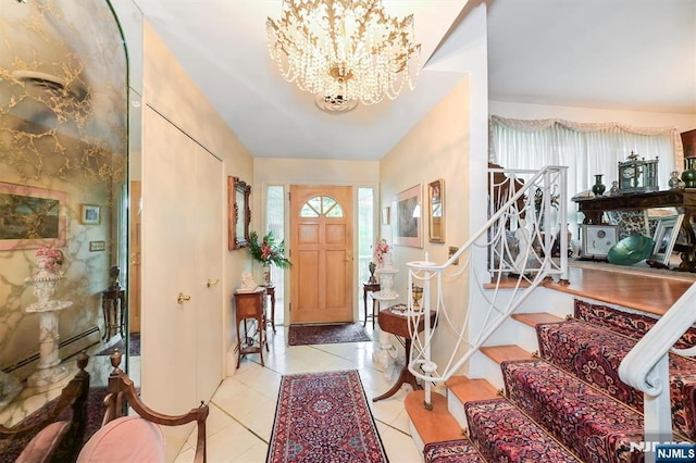 379 Mauro Rd, Englewood Cliffs, NJ 07632 - foyer entrance with stairway, a chandelier, light tile patterned floors, and a baseboard heating unit