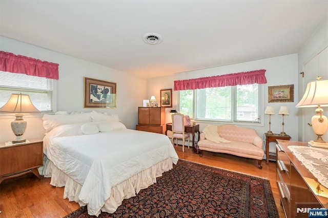 379 Mauro Rd, Englewood Cliffs, NJ 07632 - bedroom featuring wood finished floors and a baseboard radiator