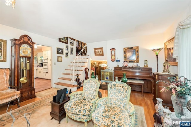 379 Mauro Rd, Englewood Cliffs, NJ 07632 - sitting room featuring stairs and wood finished floors