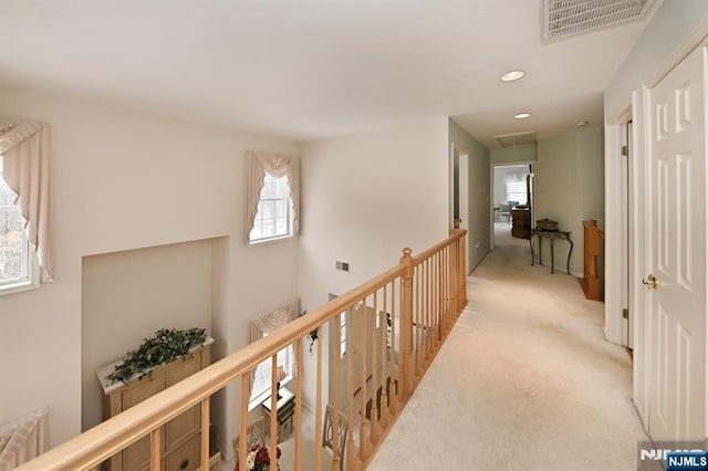 54 Hunter Rd, North Haledon, NJ 07508 - hallway with healthy amount of natural light, light carpet, and recessed lighting