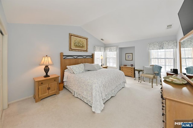 54 Hunter Rd, North Haledon, NJ 07508 - bedroom with lofted ceiling, light carpet, and baseboards
