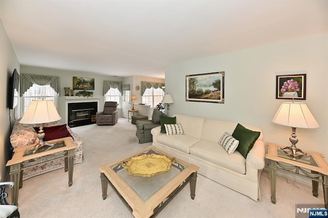 54 Hunter Rd, North Haledon, NJ 07508 - carpeted living room featuring a glass covered fireplace