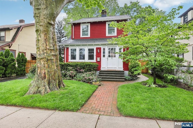5 Laurel Pl, Glen Ridge, NJ 07028 - view of front of home with a chimney and a shingled roof